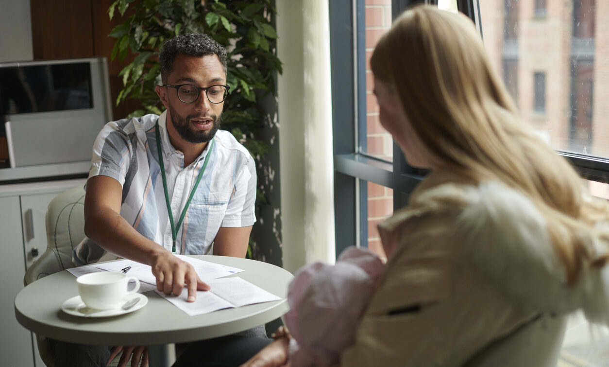 man giving support to woman