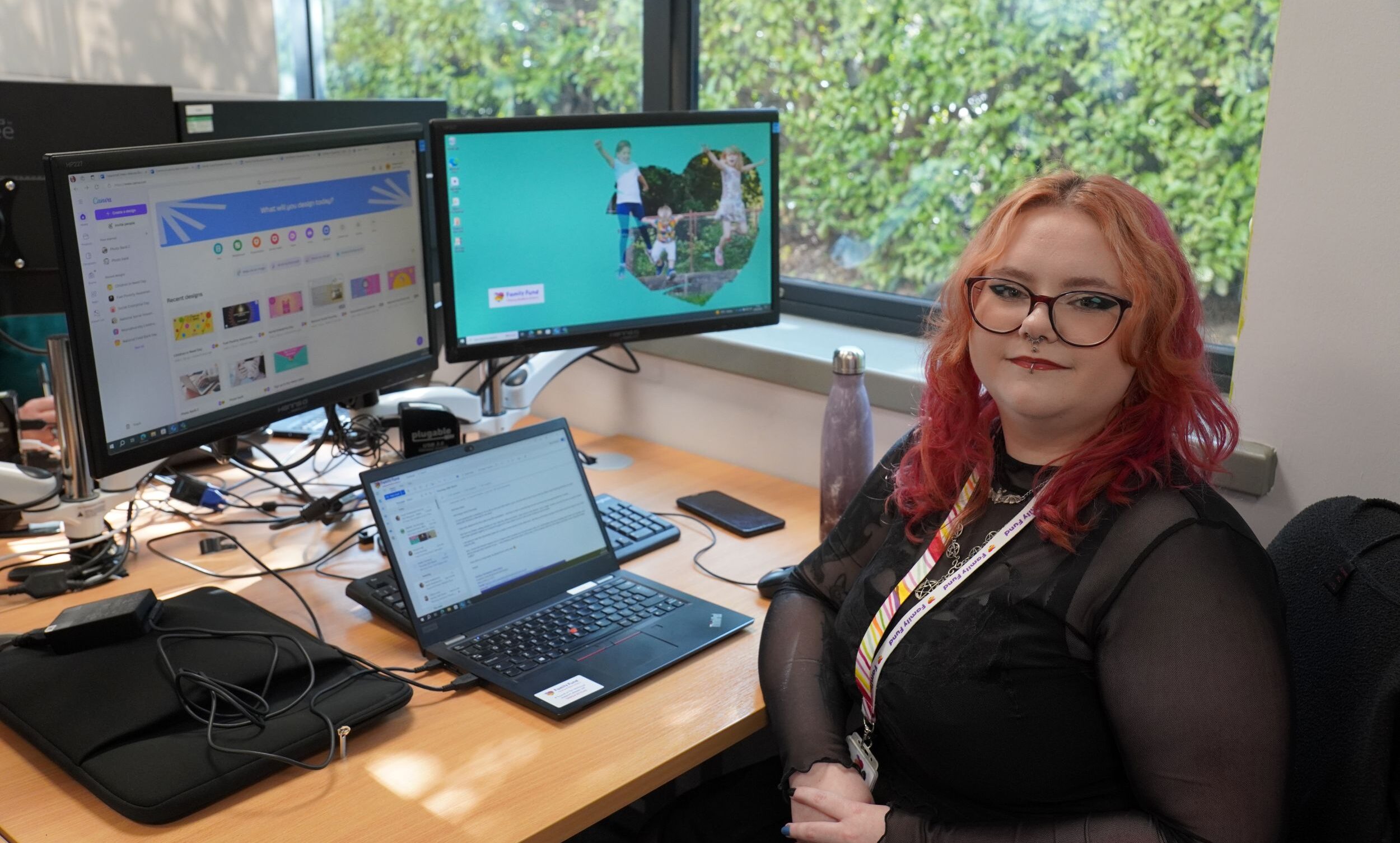 Grace, Supported Intern, at her desk